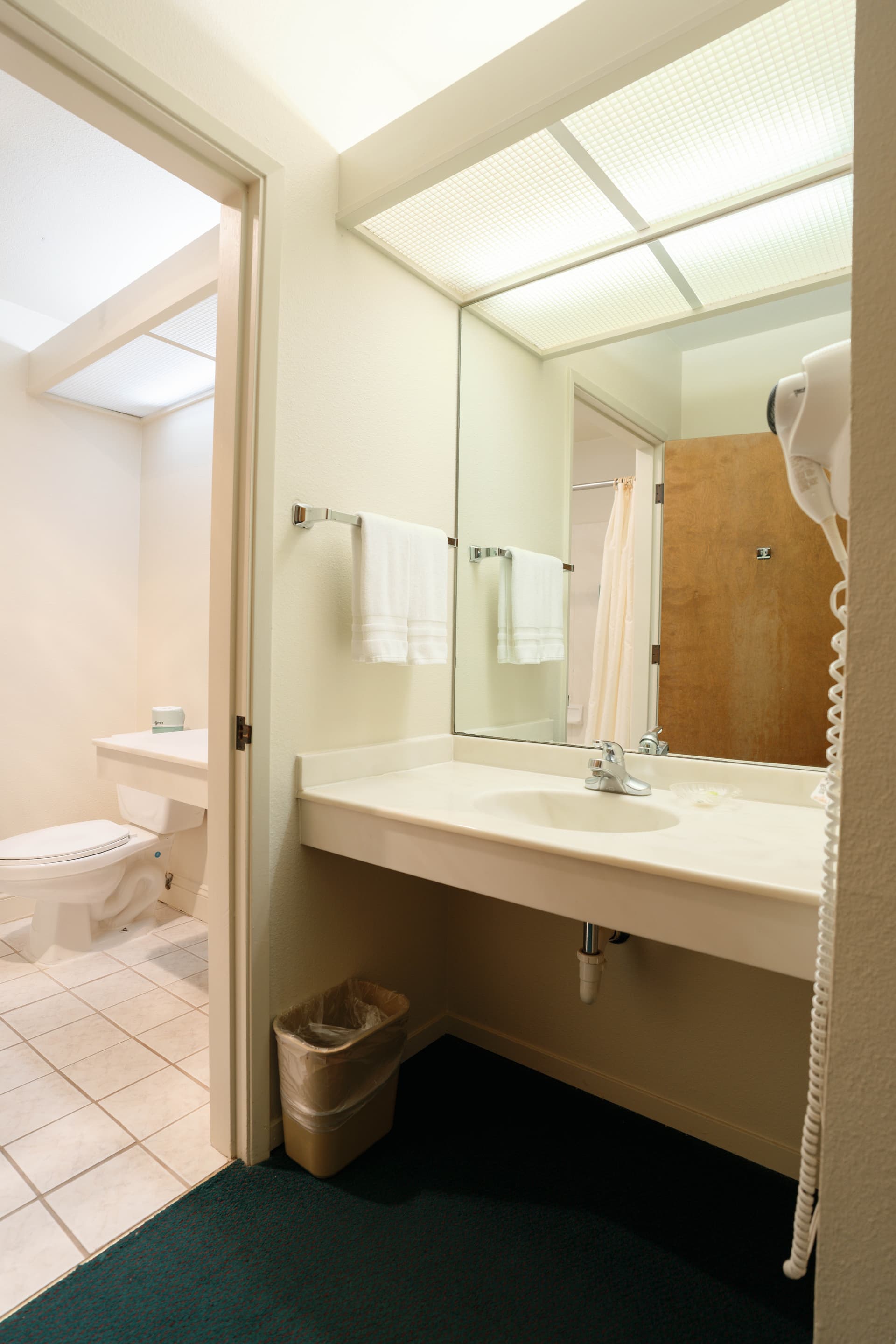 Custom artisan mirror reflecting the morning Pacific light